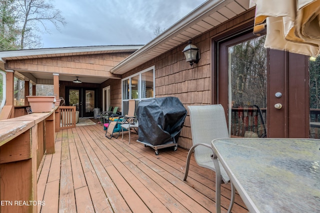 deck featuring grilling area and french doors