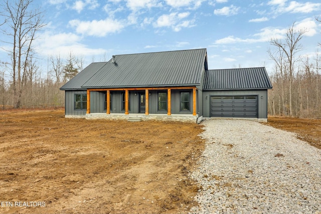 exterior space with gravel driveway