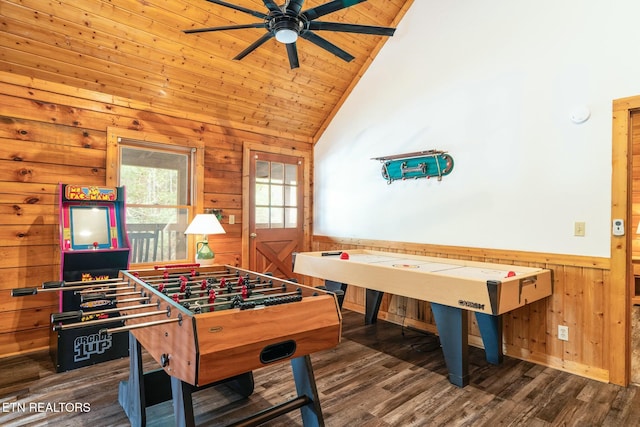 rec room featuring wood ceiling, wainscoting, vaulted ceiling, and wooden walls