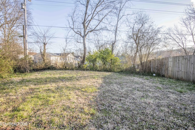 view of yard with fence