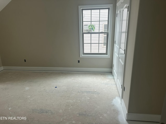 empty room featuring baseboards