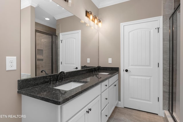 full bath featuring a shower stall and a sink