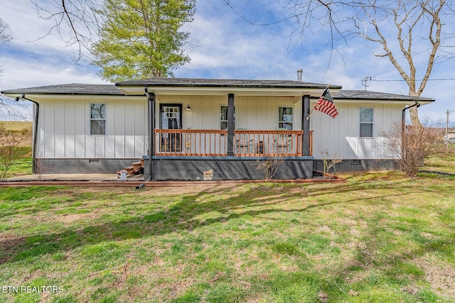 view of front of property with crawl space, covered porch, and a front yard