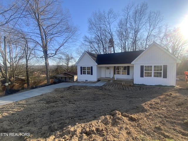 view of front of house with concrete driveway