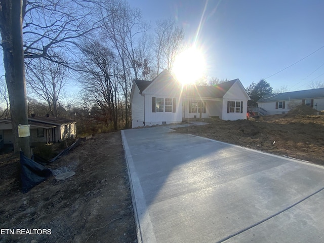 view of front of home with crawl space