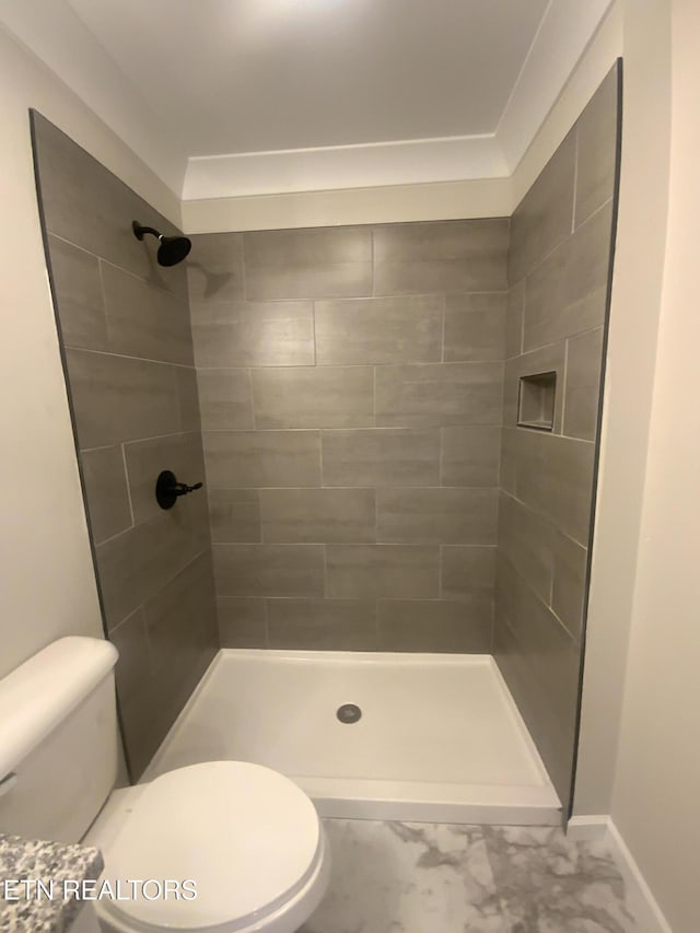 full bath with a shower stall and toilet