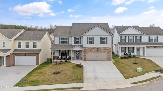 traditional-style house with cooling unit, covered porch, a front lawn, and concrete driveway