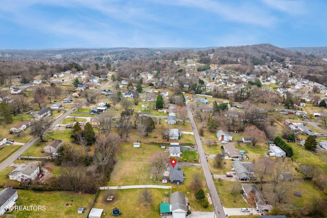 birds eye view of property with a residential view