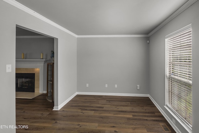 unfurnished living room with baseboards, visible vents, ornamental molding, and dark wood-type flooring