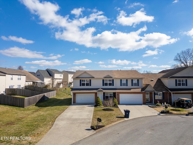 view of front of house with driveway, a front lawn, fence, and a residential view