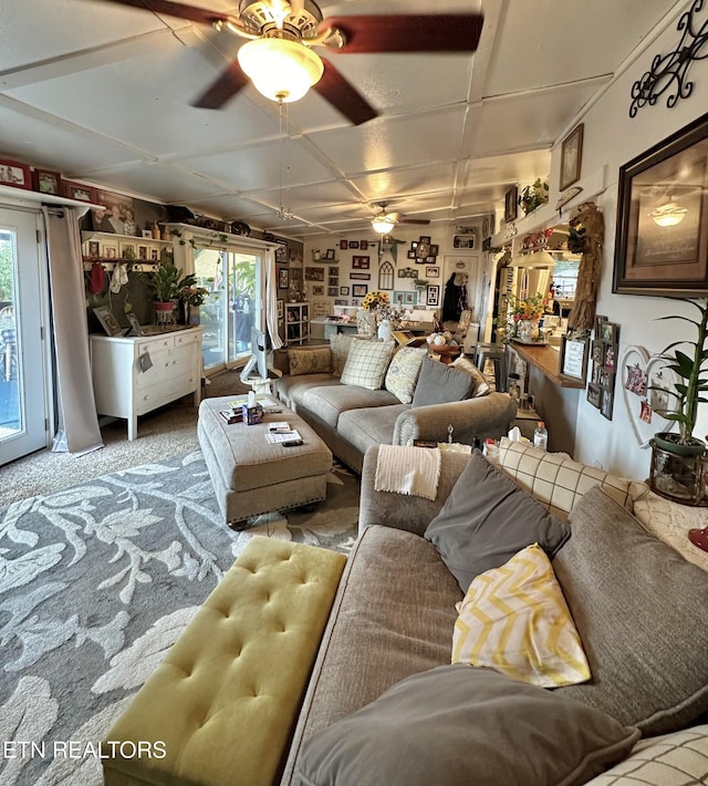 living room featuring a ceiling fan