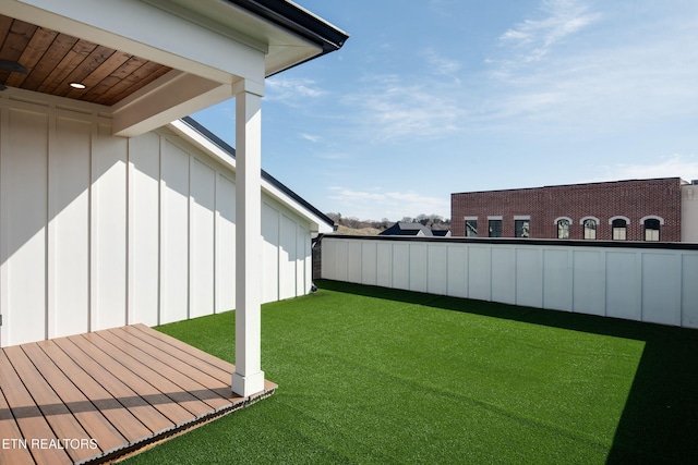 view of yard featuring fence