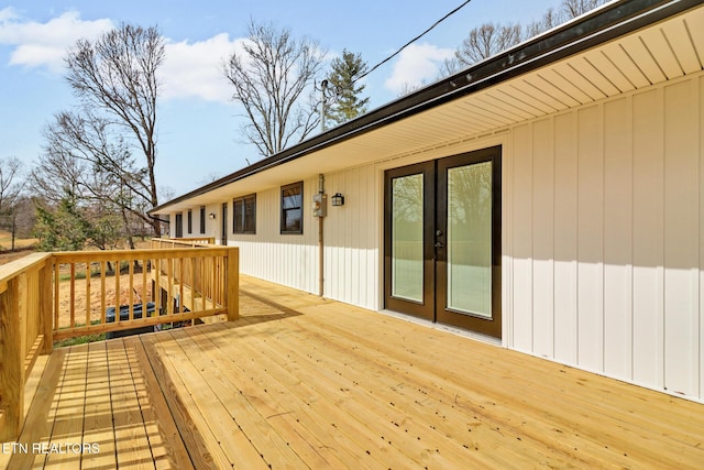 wooden deck featuring french doors