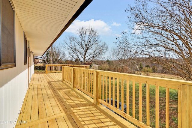 deck with an outbuilding