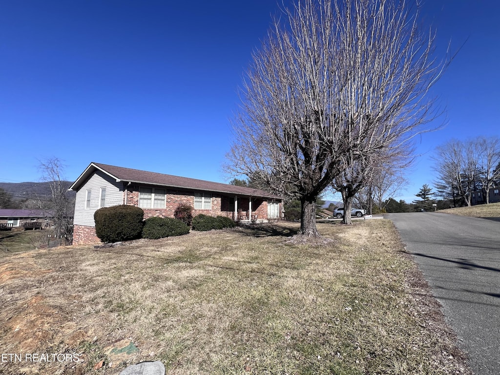 view of front of property with brick siding