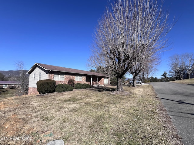 view of front of property with brick siding