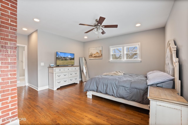 bedroom featuring a ceiling fan, recessed lighting, baseboards, and wood finished floors