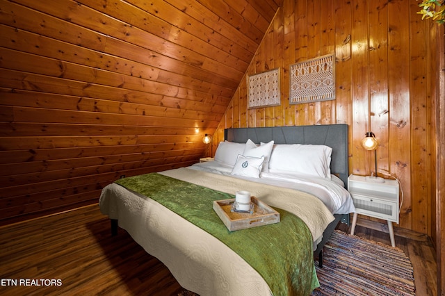 bedroom with wood walls, wood ceiling, vaulted ceiling, and wood finished floors