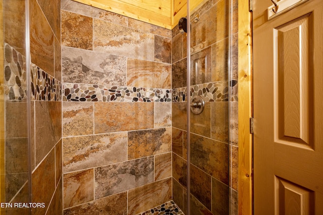 room details with a tile shower