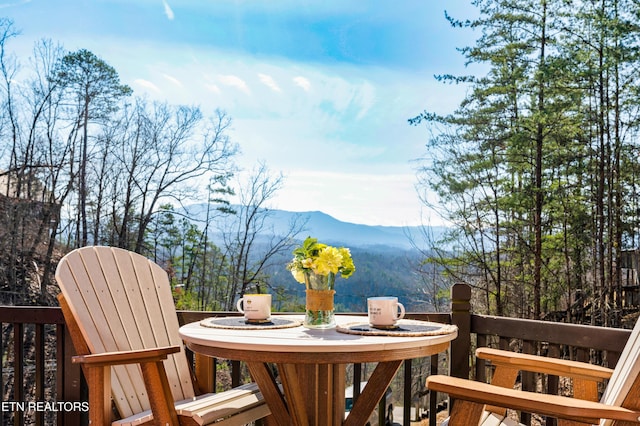 deck with a mountain view