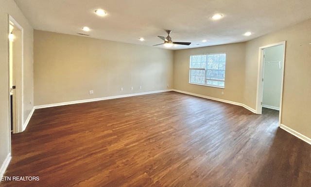 unfurnished room featuring dark wood finished floors, recessed lighting, baseboards, and ceiling fan