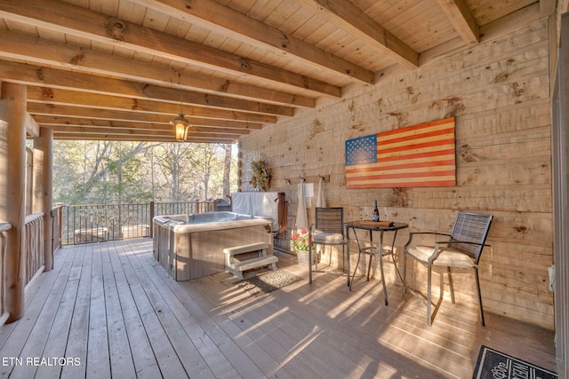 deck with a hot tub