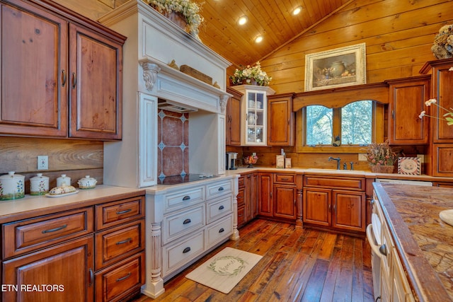 kitchen featuring wooden ceiling, dark wood-type flooring, vaulted ceiling, wooden counters, and a sink