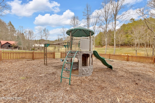 communal playground featuring fence