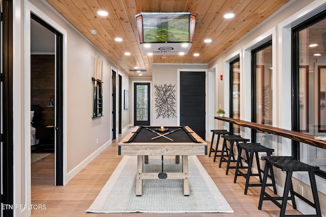 playroom with recessed lighting, light wood-type flooring, and wooden ceiling