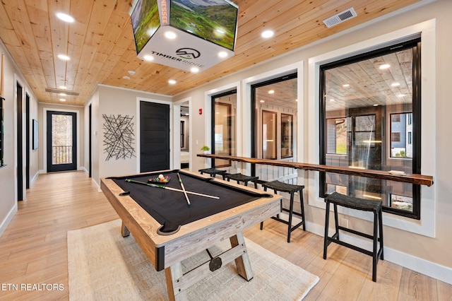 rec room featuring wooden ceiling, visible vents, and light wood finished floors