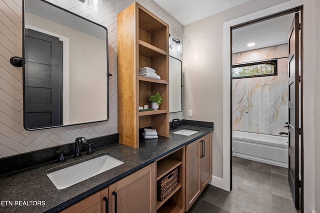 full bathroom featuring double vanity, shower / bath combination, built in features, and a sink