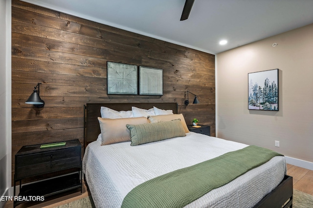 bedroom featuring recessed lighting, baseboards, ceiling fan, and wood finished floors