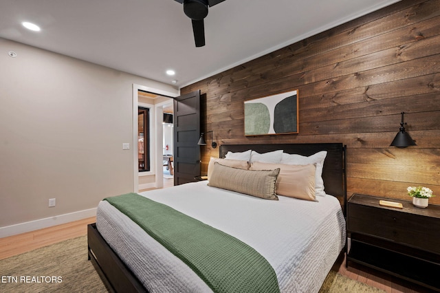 bedroom featuring recessed lighting, wood finished floors, baseboards, and ceiling fan