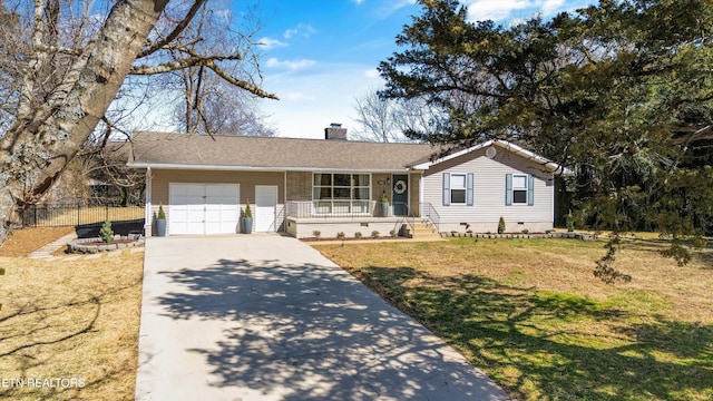 single story home featuring crawl space, driveway, a front yard, and a garage