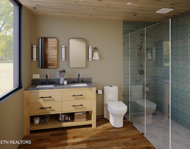 bathroom featuring a sink, toilet, wooden ceiling, and a shower stall