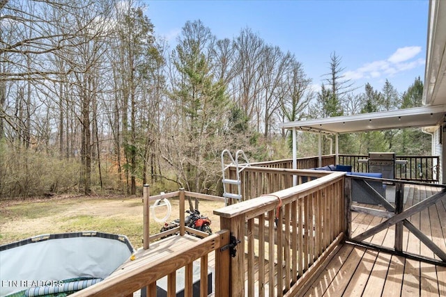 wooden deck with area for grilling