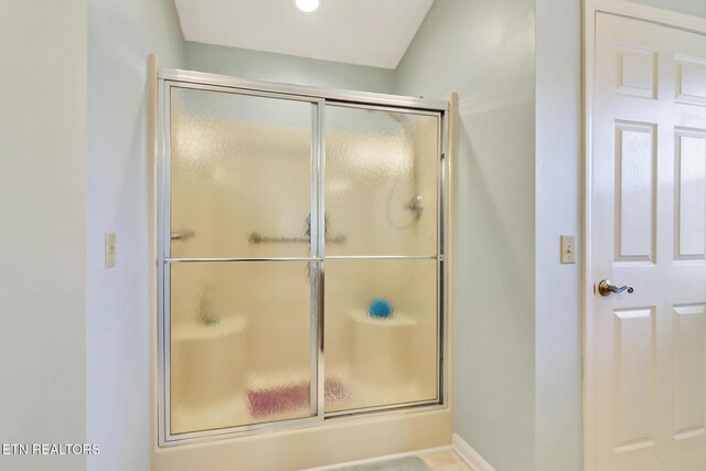 bathroom featuring a stall shower