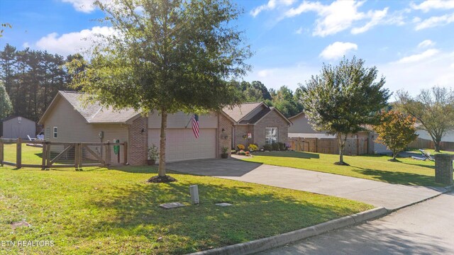 ranch-style house featuring brick siding, fence, a front yard, a garage, and driveway