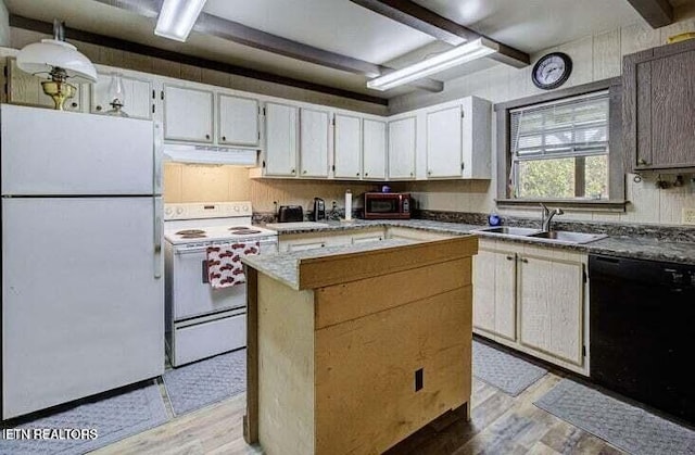 kitchen with white appliances, light wood-style flooring, a center island, a sink, and exhaust hood