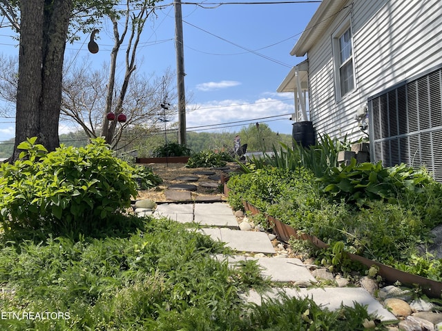view of yard featuring central AC unit