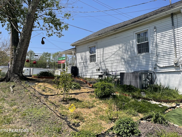 view of home's exterior featuring central AC unit