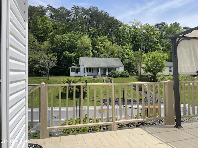 view of wooden balcony with a deck