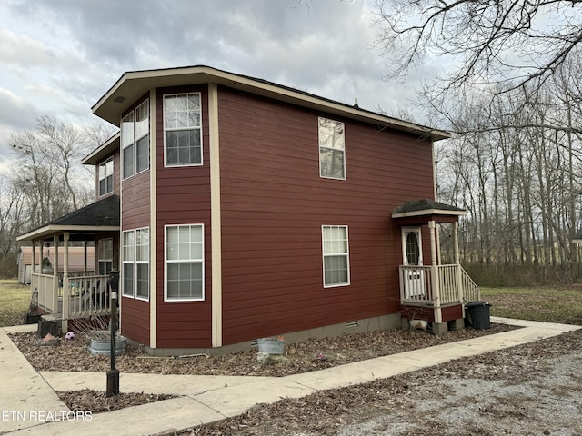 view of property exterior with crawl space