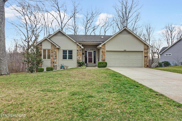 single story home with stone siding, an attached garage, concrete driveway, and a front yard