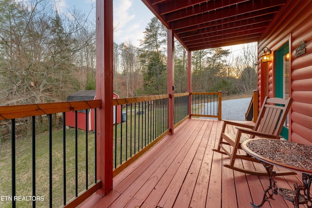 deck featuring a yard