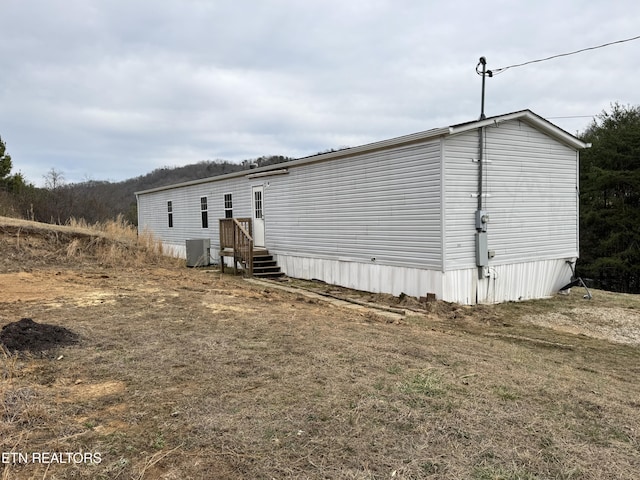 exterior space with central AC unit