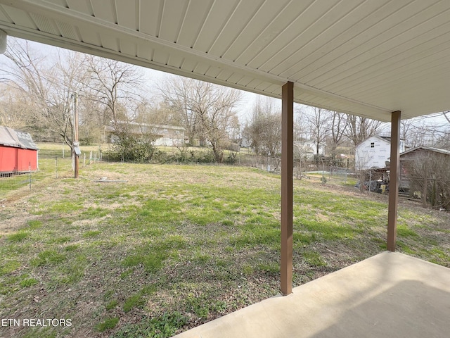 view of yard featuring a patio area and a fenced backyard