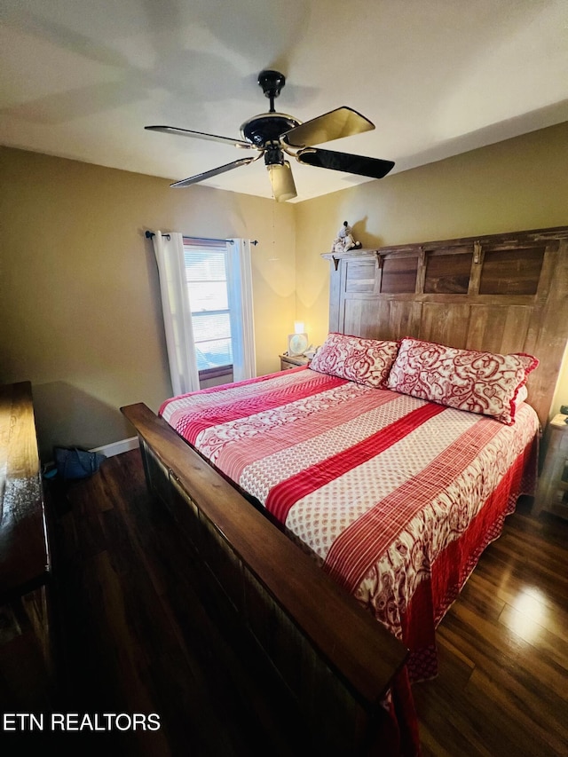 bedroom with ceiling fan and wood finished floors