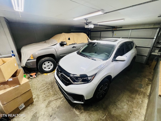 garage featuring a garage door opener