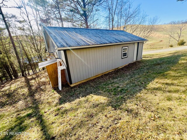 view of outbuilding featuring an outdoor structure